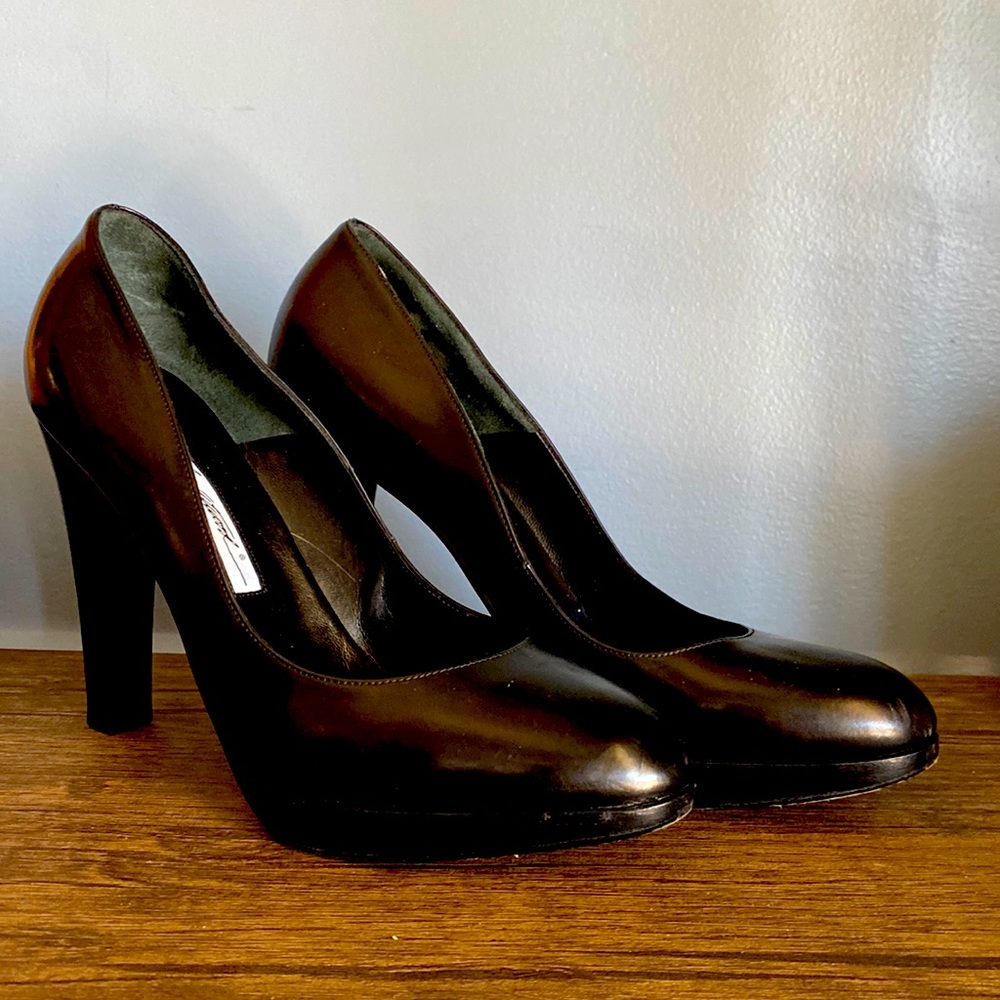Black Leather Brian Atwood round toe platform pumps with a stacked block heel